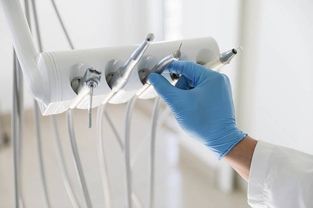 Professional Tooth Extraction technician working in Warren Park, IN